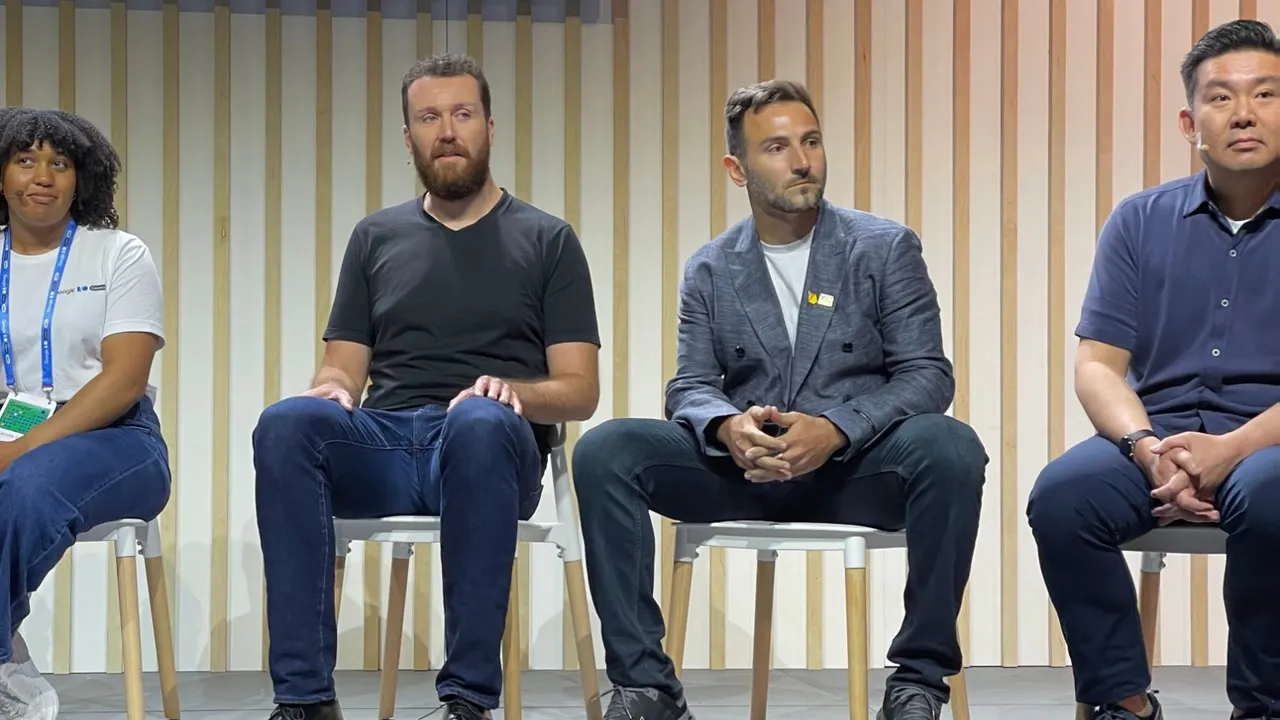 Ibrahim Ulukaya, second from right, seated on a panel at Google I/O Connect Miami 2023